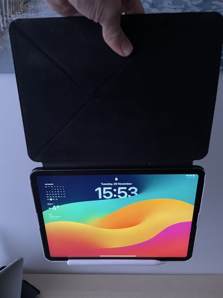ipad folio case with ipad pro and apple pencil handing in air testing magnets