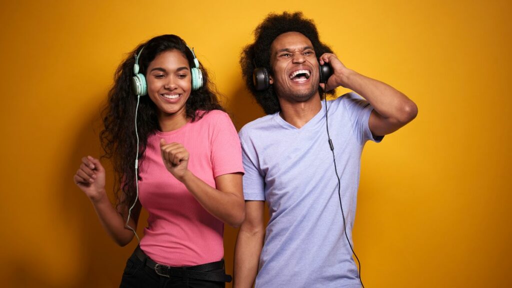 two people listening to music together